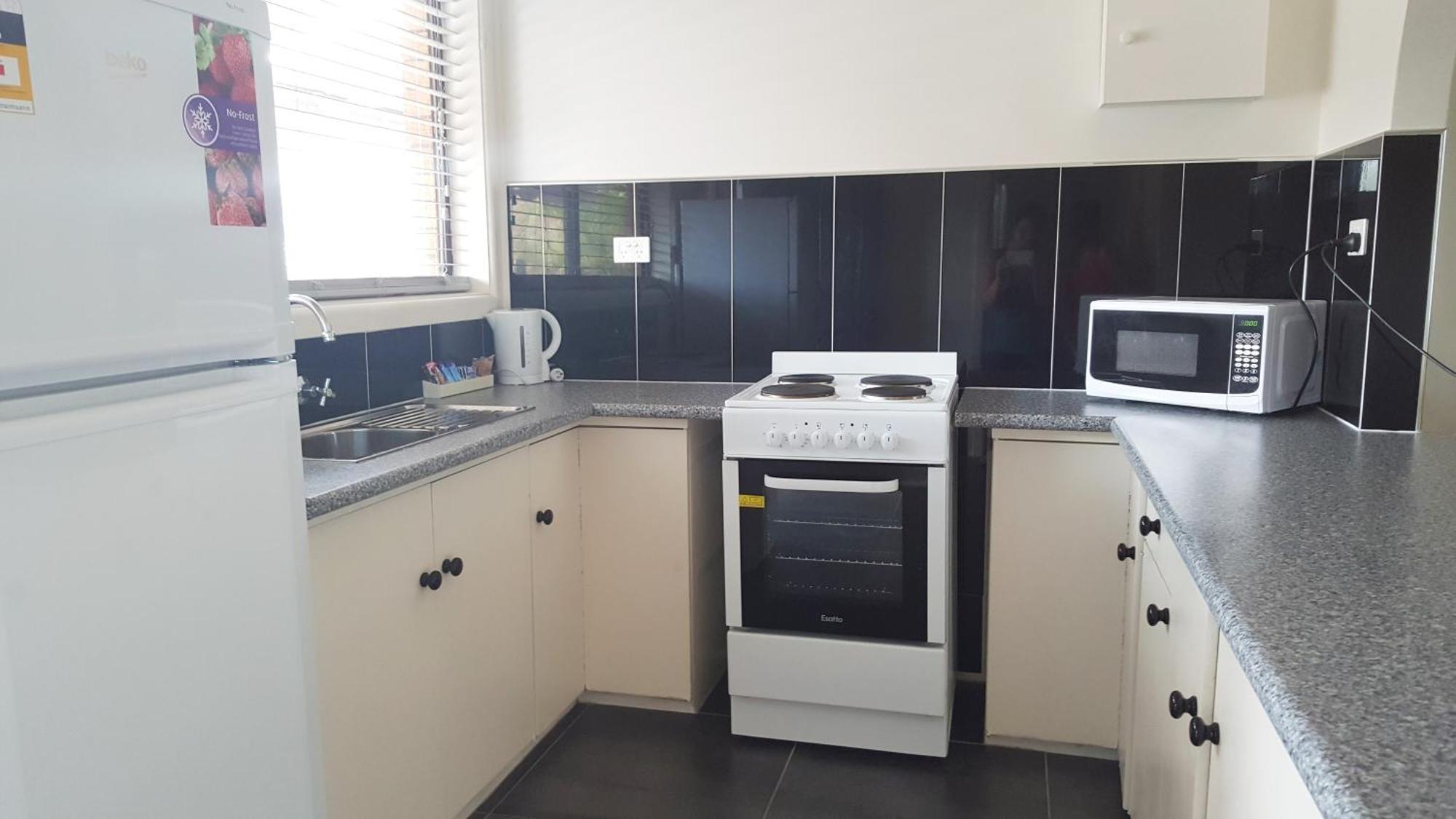 Tuncurry Motor Hospedaje Habitación foto